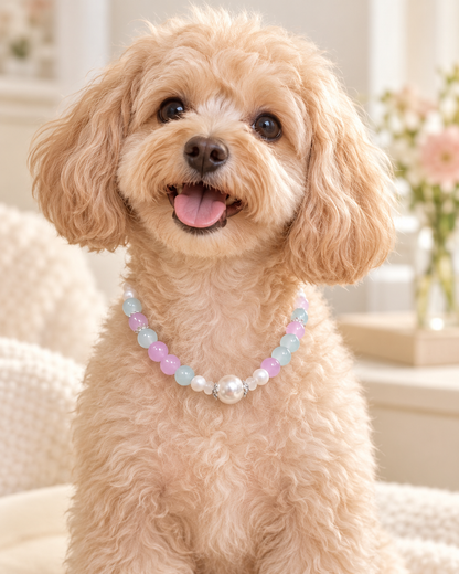 Small dog wearing lavender and aqua pearl-style pet necklace