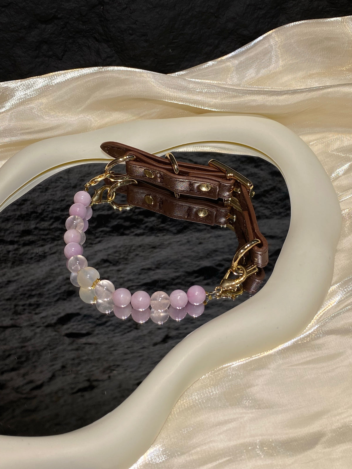 Soft Lavender crystal pet collar with pale purple and translucent beads styled on cream satin