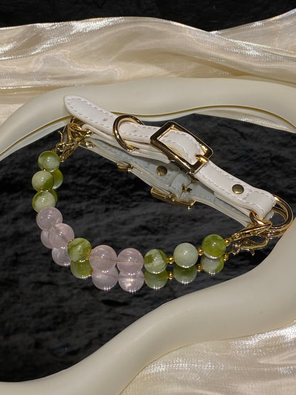Green Mist & Peach crystal pet collar with pastel pink and green beads styled on cream satin