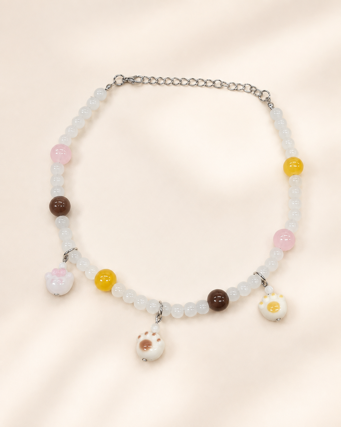 Sweet Paw Charm beaded pet necklace with silver-tone extension chain