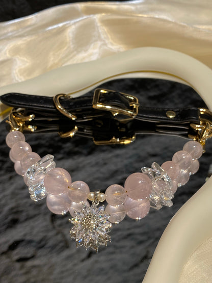 Close-up of sparkling snowflake charm and blush pink beads on Blush Snowflake crystal pet collar