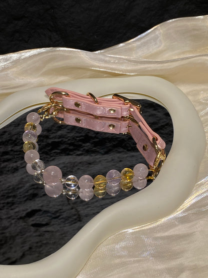 Close-up of blush pink, clear, pale lavender and warm yellow beads on Peach Glow crystal pet collar