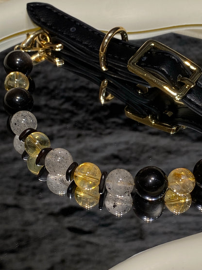 Black strap and gold-tone buckle detail on Midnight Gold mixed-bead crystal pet collar