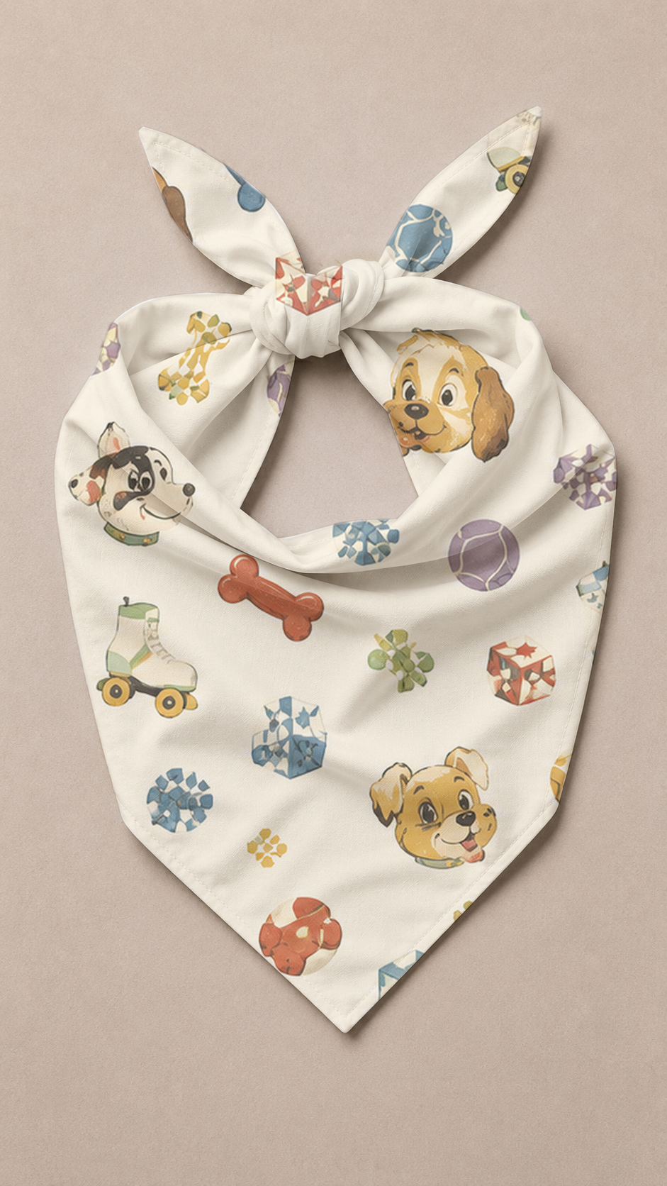 A white tie-front bandana scarf featuring a playful print of cartoon dogs, bones, and colorful paw prints, displayed flat against a solid beige background.